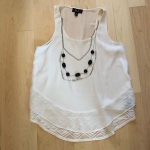 Sleeveless White Blouse